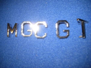 MGCGT TAILGATE BADGE SET LETTER BADGE AHC303C