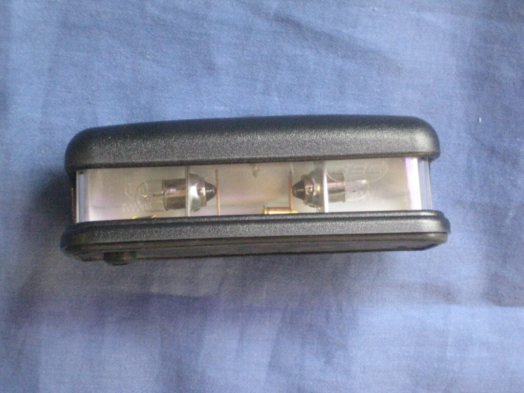 127916BLK 83H335 MGB & MIDGET NUMBER PLATE LAMP PLASTIC BLACK - Image 2